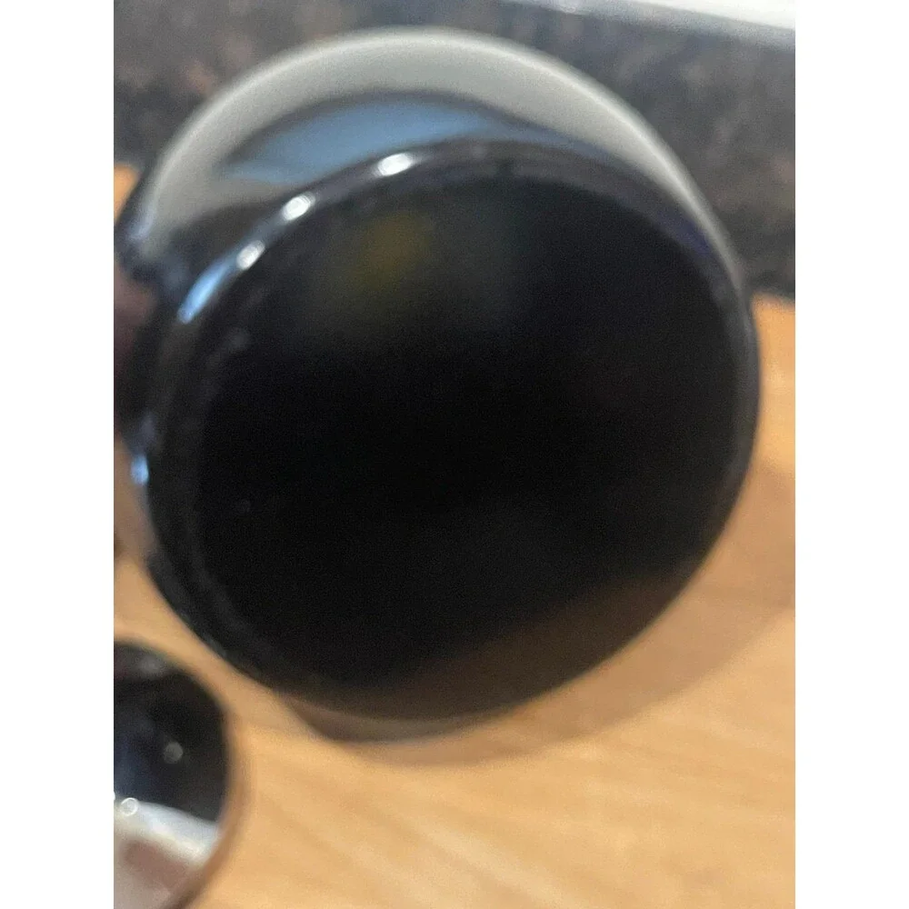 Copco black enameled tea pot with whistler